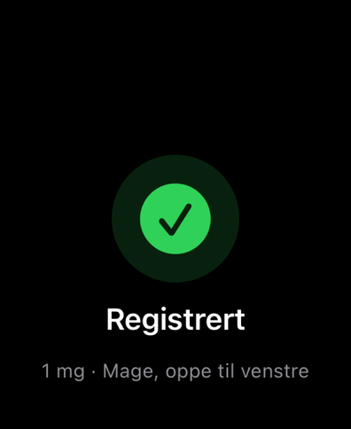 Dial på Apple Watch bekrefter en registrert dose med et hakemerke og viser mengde og injeksjonssted